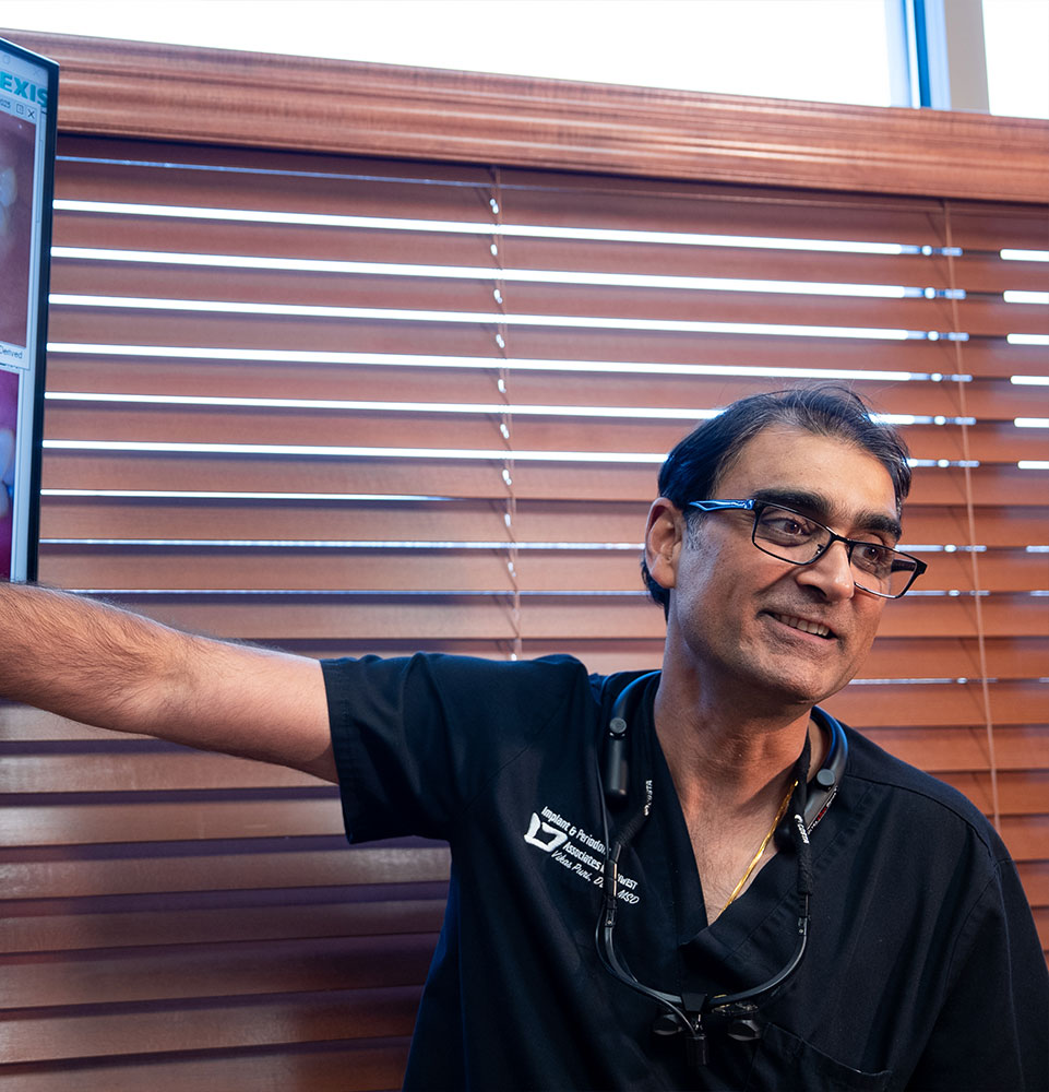 doctor going over dental procedure info