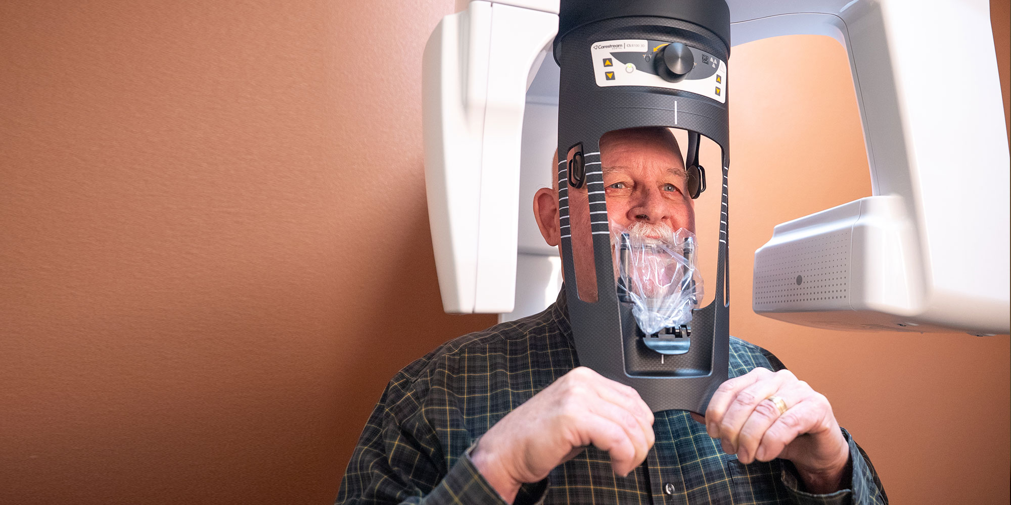 patient undergoing a cbct scan for treatment