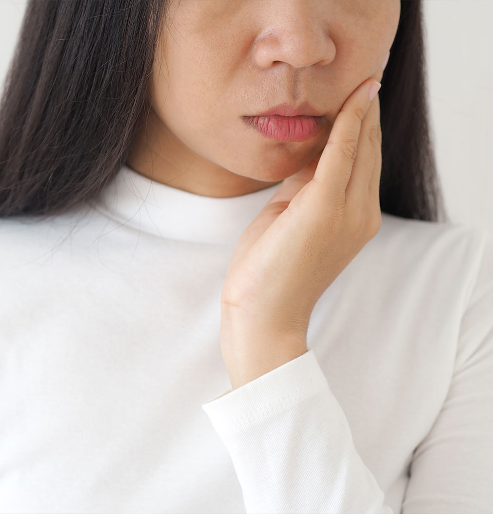 person expressing mouth pain