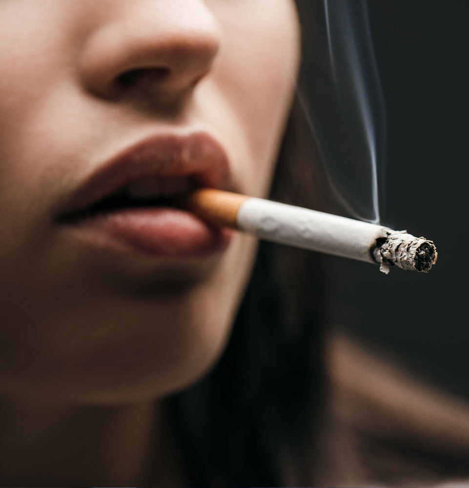 person smoking a cigarette